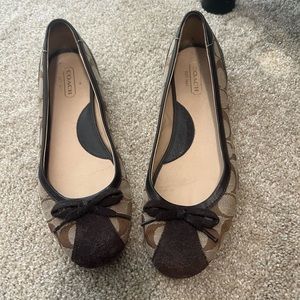 Excellent used condition Coach flats. Size 10